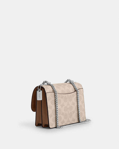 Mini Klare Crossbody Bag In Signature Canvas Signature Canvas-Silver-Sand-Taupe Signature Canvas-Silver-Sand-Taupe
