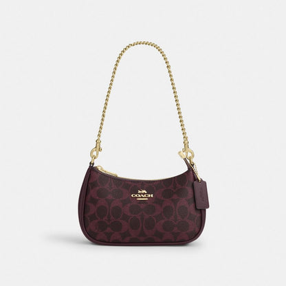 Coach Teri Mini Crossbody Bag In Signature Canvas Gold/Black Currant