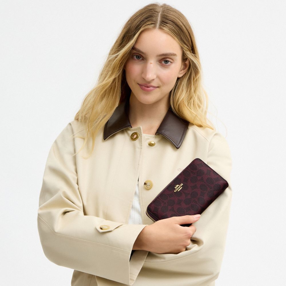 Coach Long Zip Around Wallet In Signature Canvas Gold/Navy