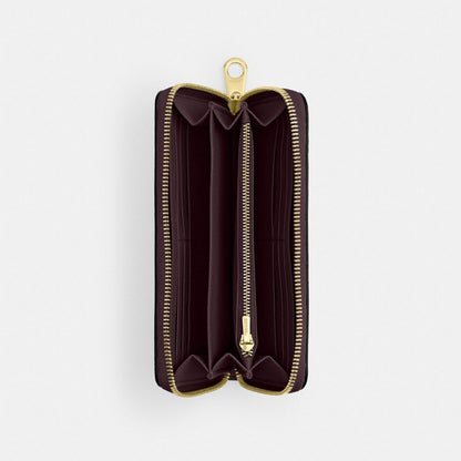 Coach Long Zip Around Wallet In Signature Canvas Gold/Black Currant
