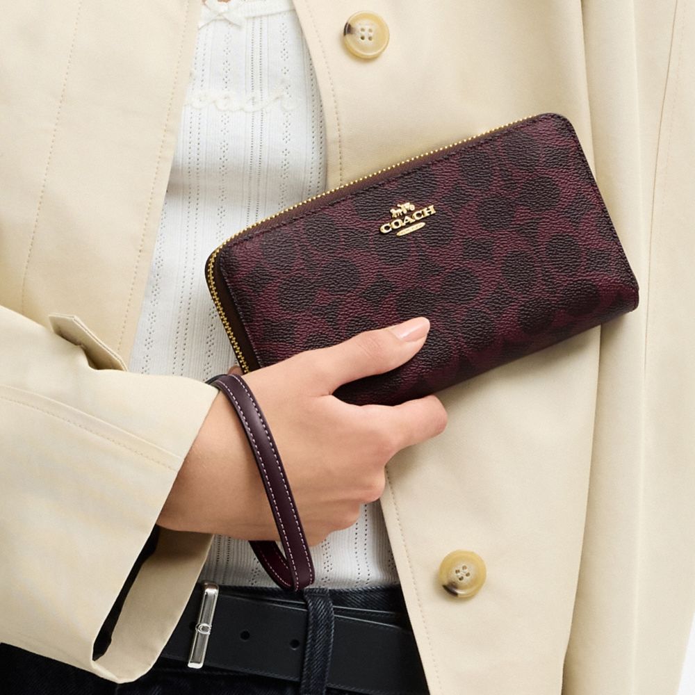 Coach Long Zip Around Wallet In Signature Canvas Gold/Black Currant