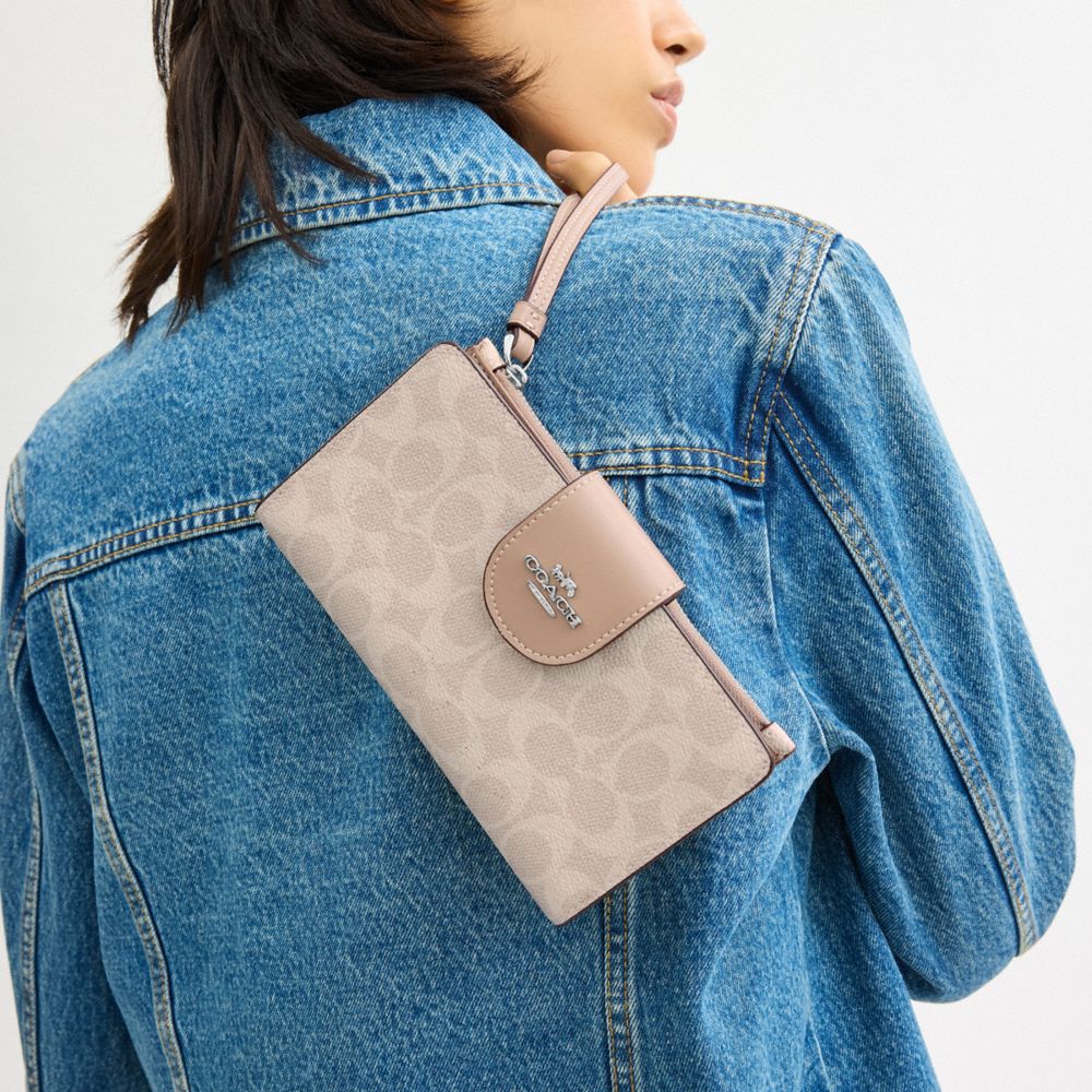 Coach Phone Wallet In Signature Canvas Silver
