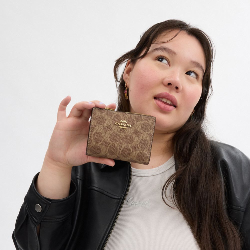 Coach Bifold Wallet In Signature Canvas Gold Tan Brown