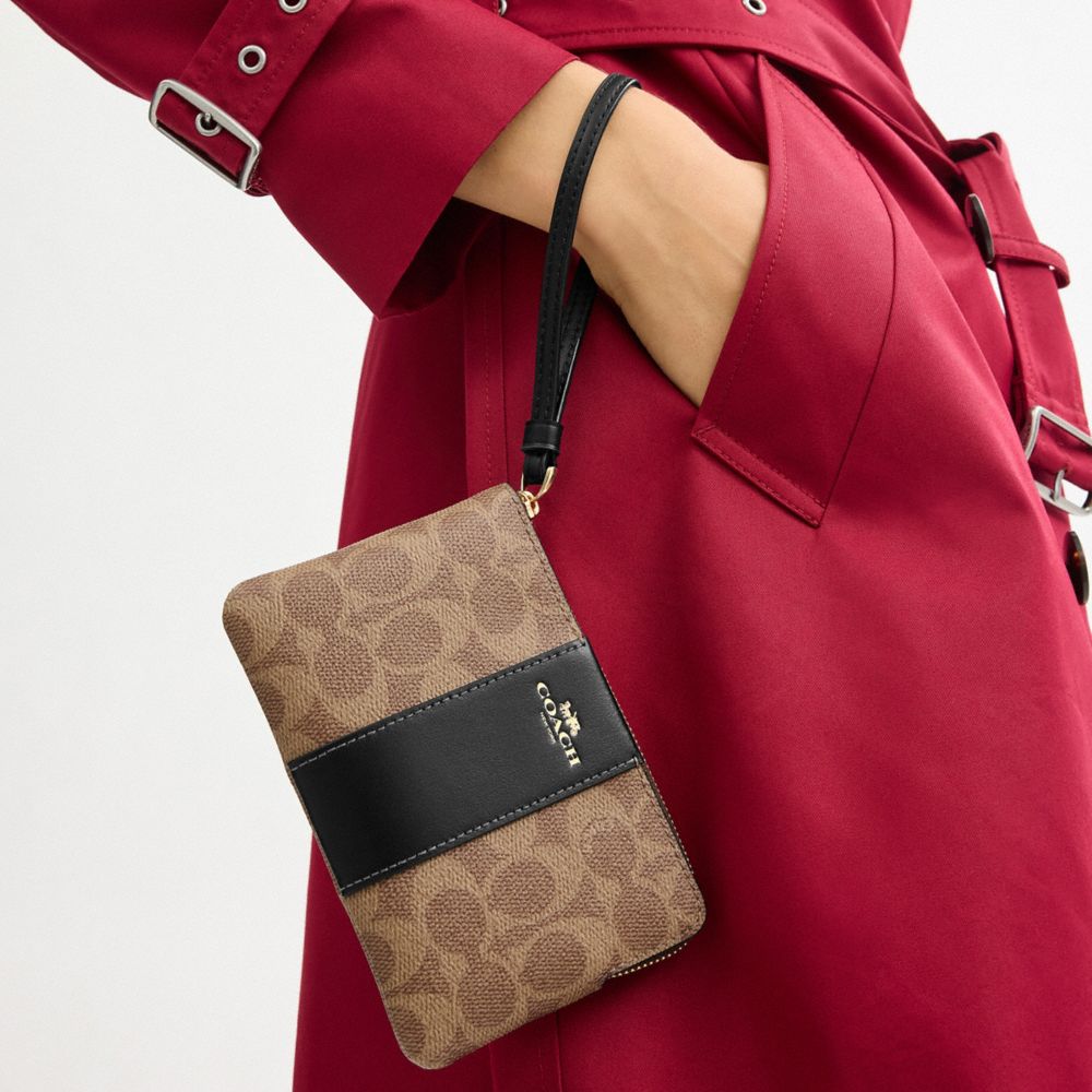 Coach Corner Zip Wristlet In Signature Canvas With Stripe Gold Tan Black