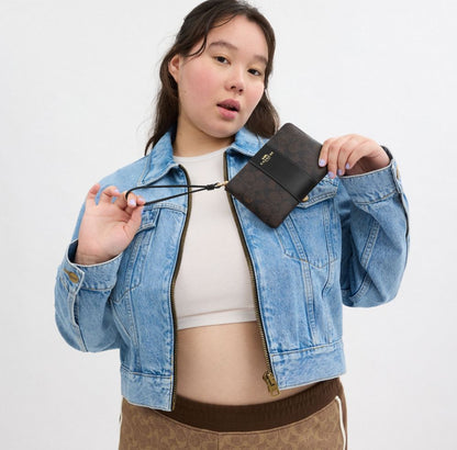 Coach Corner Zip Wristlet In Signature Canvas With Stripe Gold Walnut Black