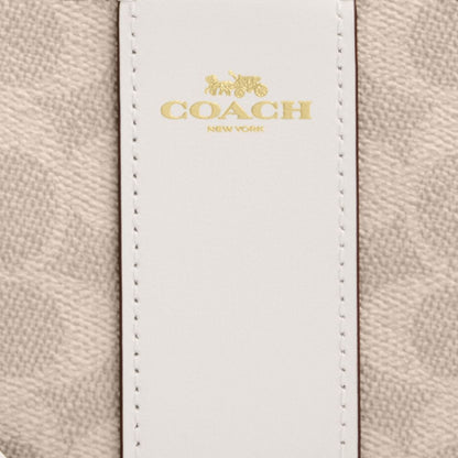 Coach Corner Zip Wristlet In Signature Canvas With Stripe Gold Sand Chalk