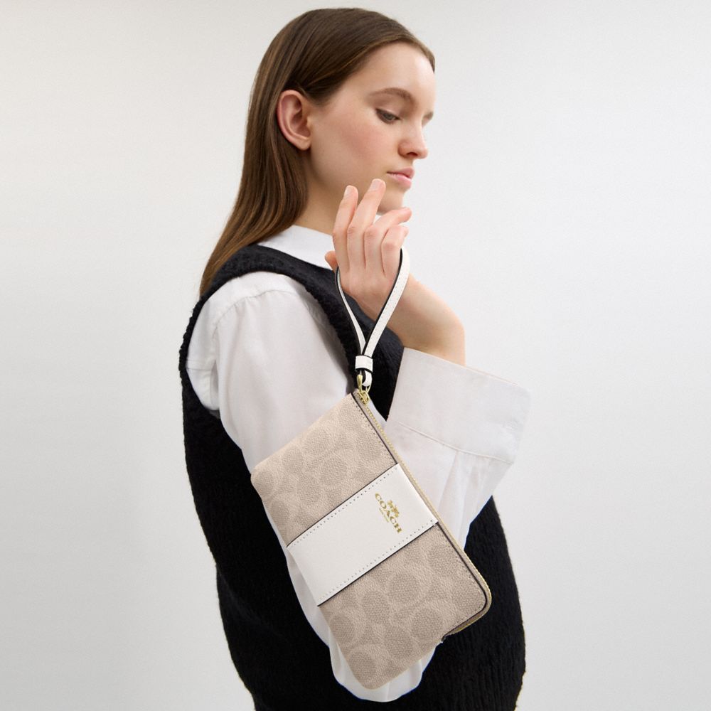 Corner Zip Wristlet In Signature Canvas With Stripe Signature Canvas-Gold-Sand-Chalk Signature Canvas-Gold-Sand-Chalk