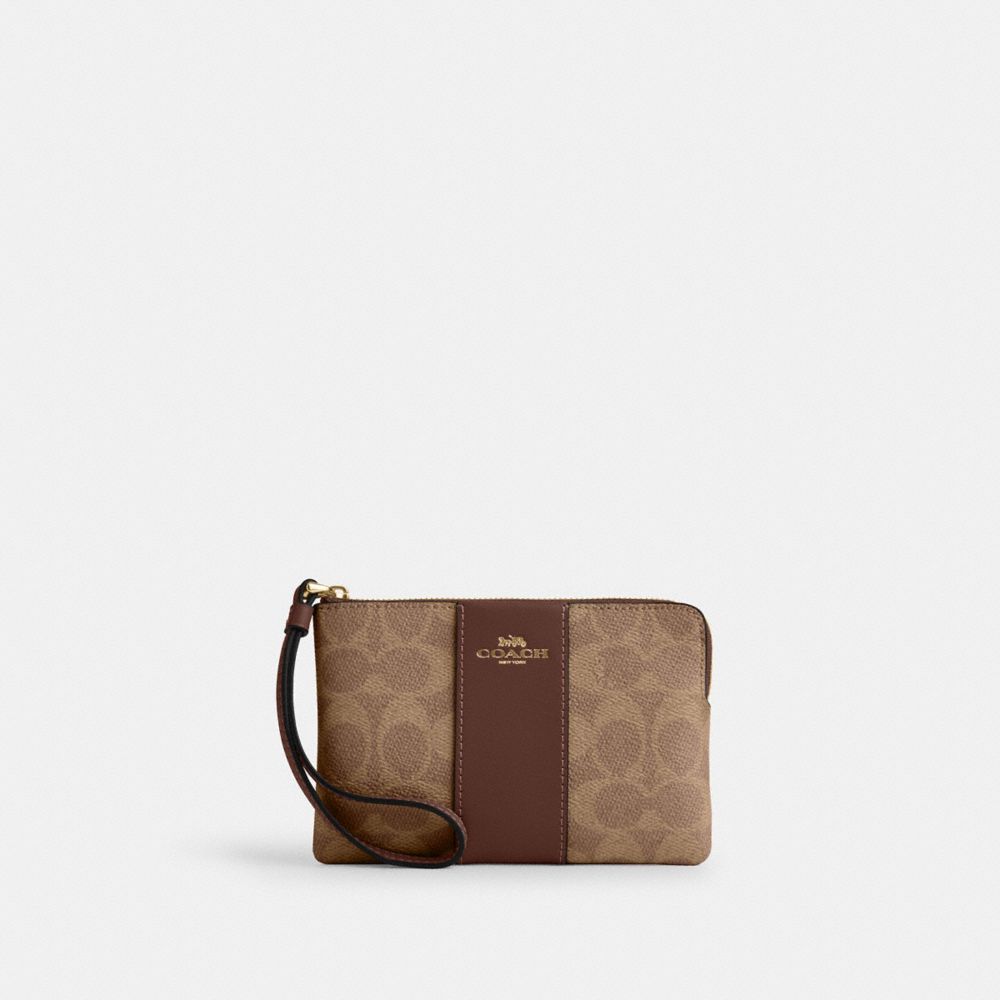 Coach Corner Zip Wristlet In Signature Canvas With Stripe Gold Tan Brown