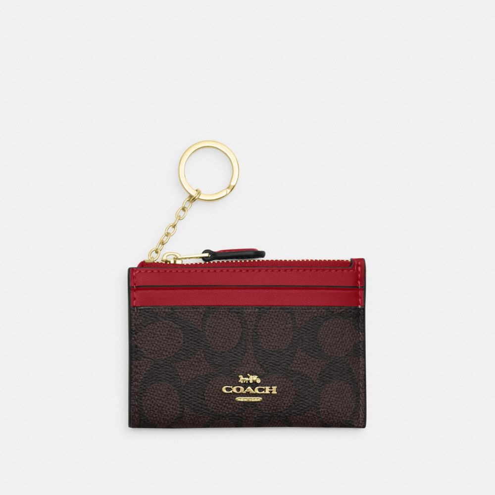 Mini Skinny Id Case In Signature Canvas Signature Canvas-Im-Walnut-True Red Signature Canvas-Im-Walnut-True Red