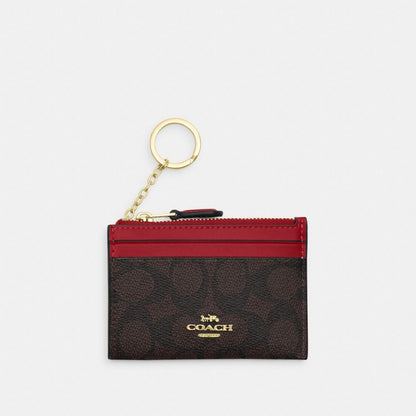 Mini Skinny Id Case In Signature Canvas Signature Canvas-Im-Walnut-True Red Signature Canvas-Im-Walnut-True Red