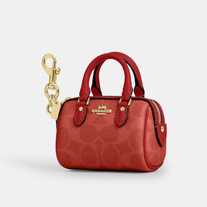 Coach Mini Rowan Bag Charm In Signature Canvas Gold Crimson