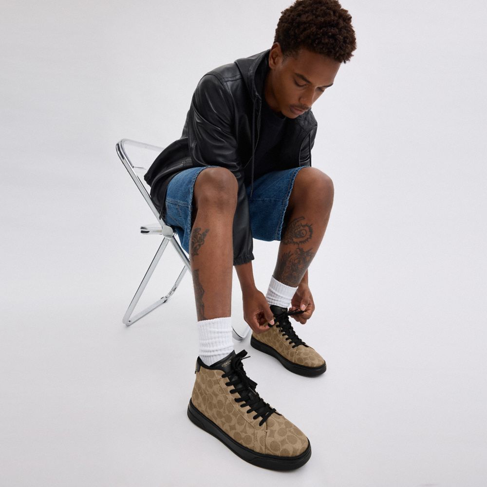 Coach High Line High Top Sneaker In Signature Canvas Khaki Black