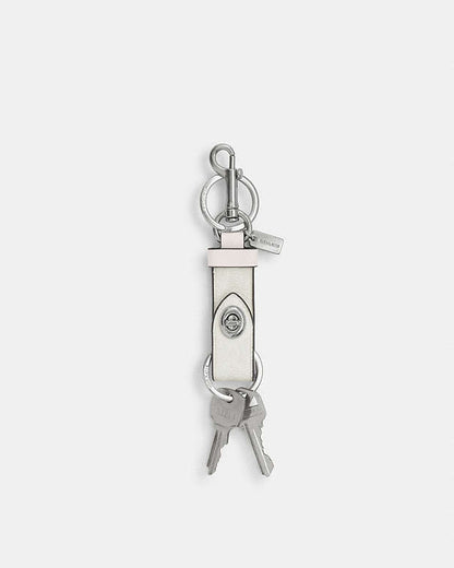 Trigger Snap Bag Charm In Signature Canvas Sv-White-Chalk Sv-White-Chalk