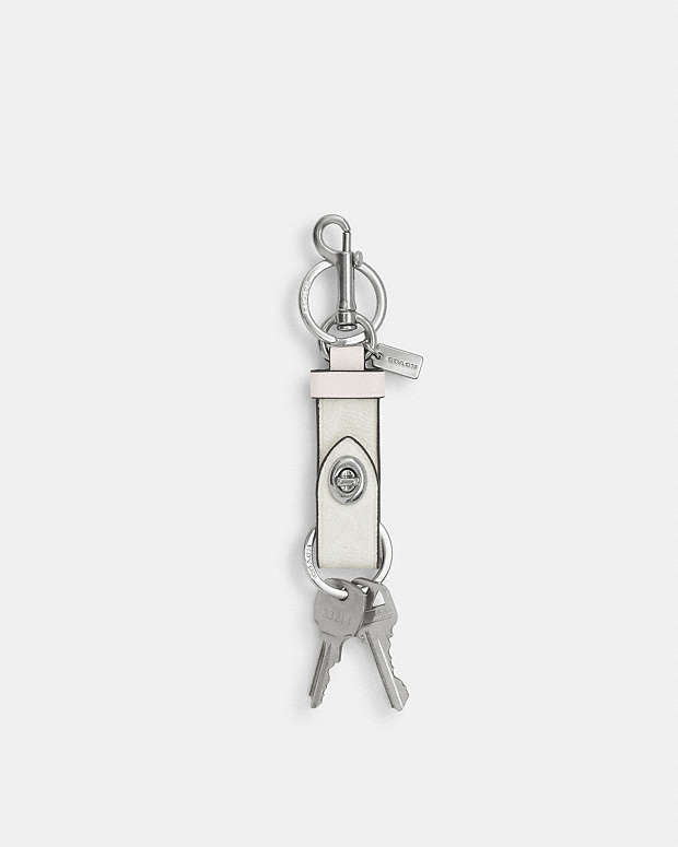 Trigger Snap Bag Charm In Signature Canvas Sv-White-Chalk Sv-White-Chalk