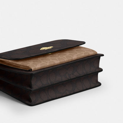 Coach Klare Crossbody Bag In Blocked Signature Canvas Gold Walnut Tan