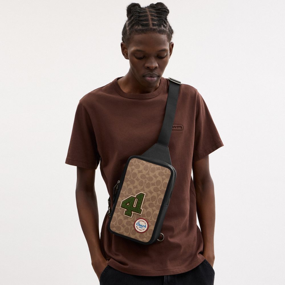 Coach Sullivan Pack In Signature Canvas With Patches Gunmetal Tan Multi