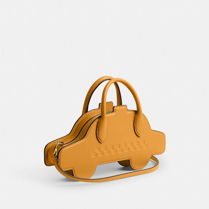 Coach Taxi Bag Brass Yellow