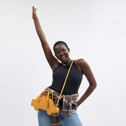 Coach Taxi Bag Brass Yellow