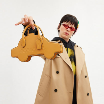 Coach Taxi Bag Brass Yellow