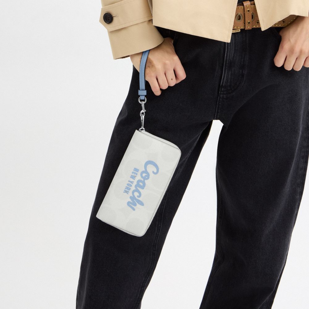 Coach Long Zip Around Wallet In Signature Canvas With Coach Graphic Silver