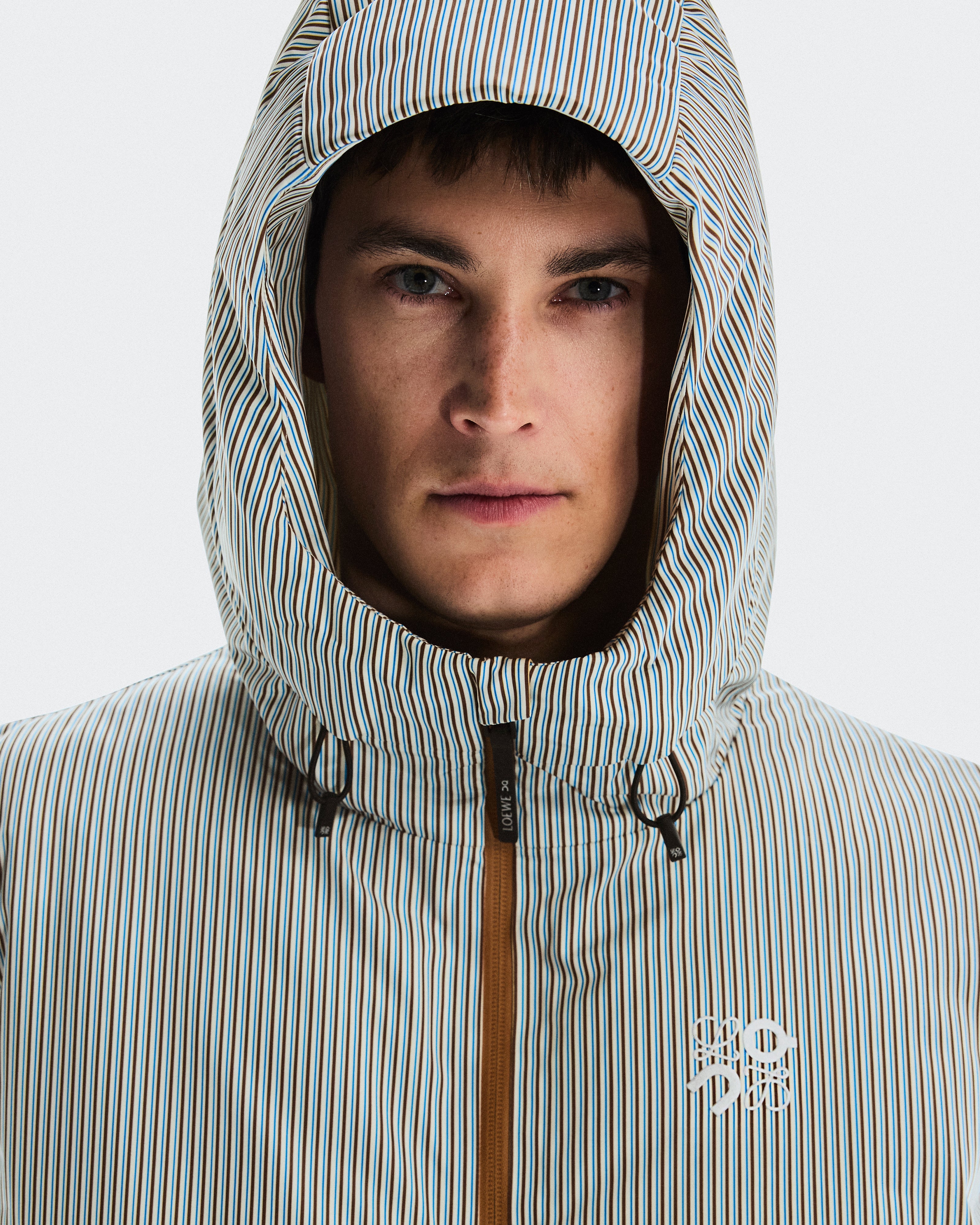 On Puffer Vest Loewe Beige | Blue