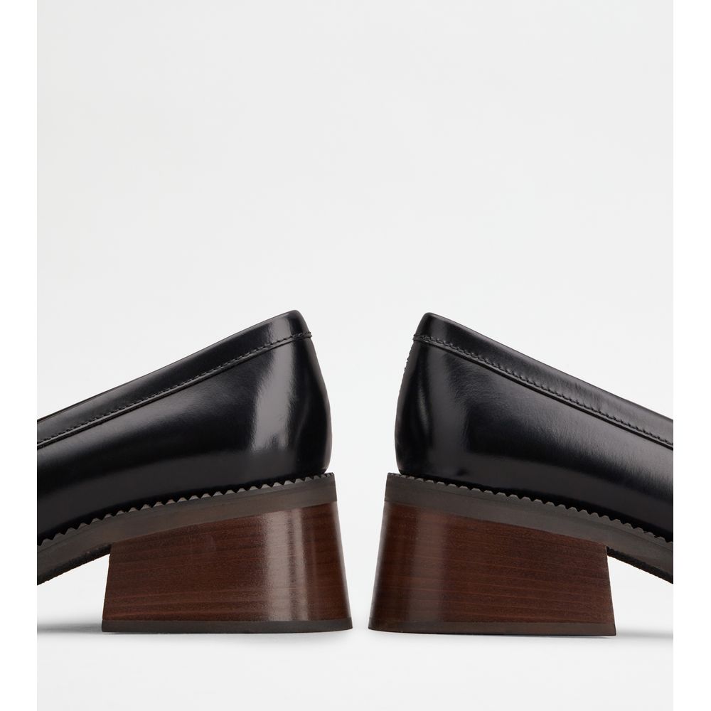 Tods Heeled Loafers In Leather Black Womens