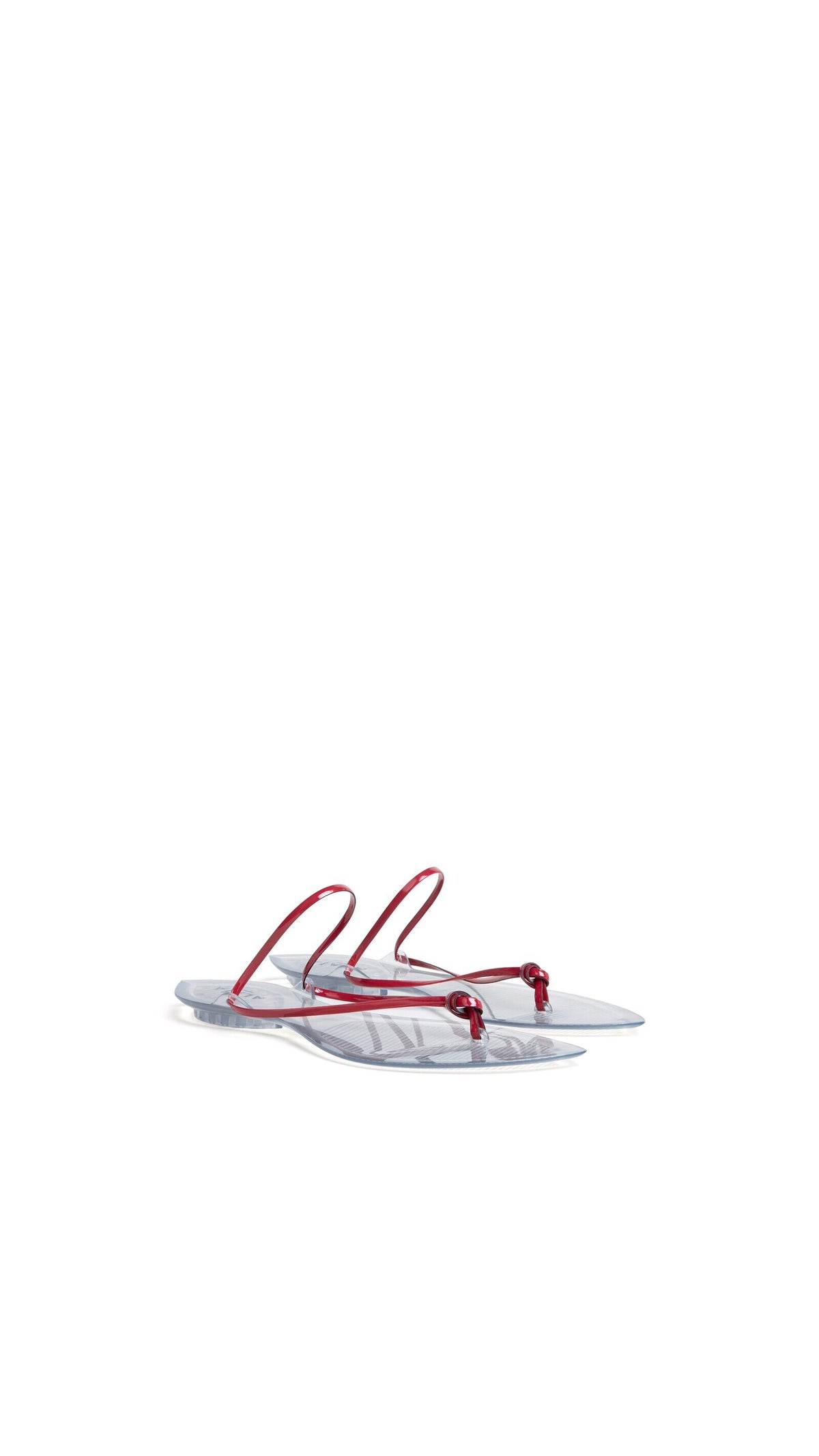 Alaïa Invisible Thong In Patent Leather