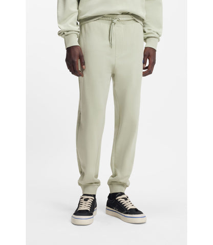 Hugo Cotton Terry Sweatpants With Logo Patch Light Green