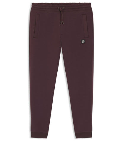 Hugo Stacked Logo Tracksuit Bottoms In A Cotton Blend Light Brown