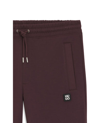 Hugo Stacked Logo Tracksuit Bottoms In A Cotton Blend Light Brown