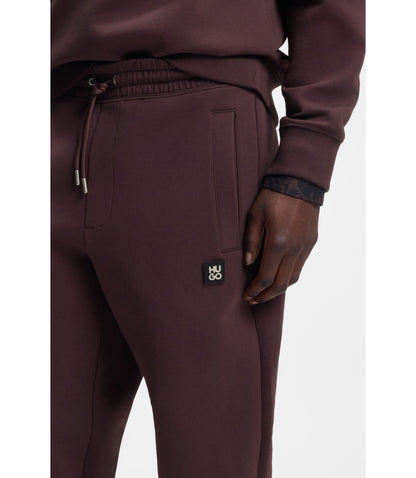 Hugo Stacked Logo Tracksuit Bottoms In A Cotton Blend Light Brown