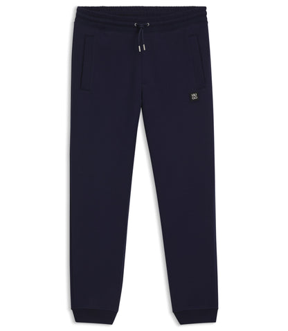 Hugo Stacked Logo Tracksuit Bottoms In A Cotton Blend Dark Blue