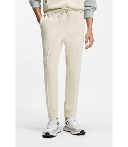 Boss Piping Detail Tracksuit Bottoms In A Cotton Blend Light Beige