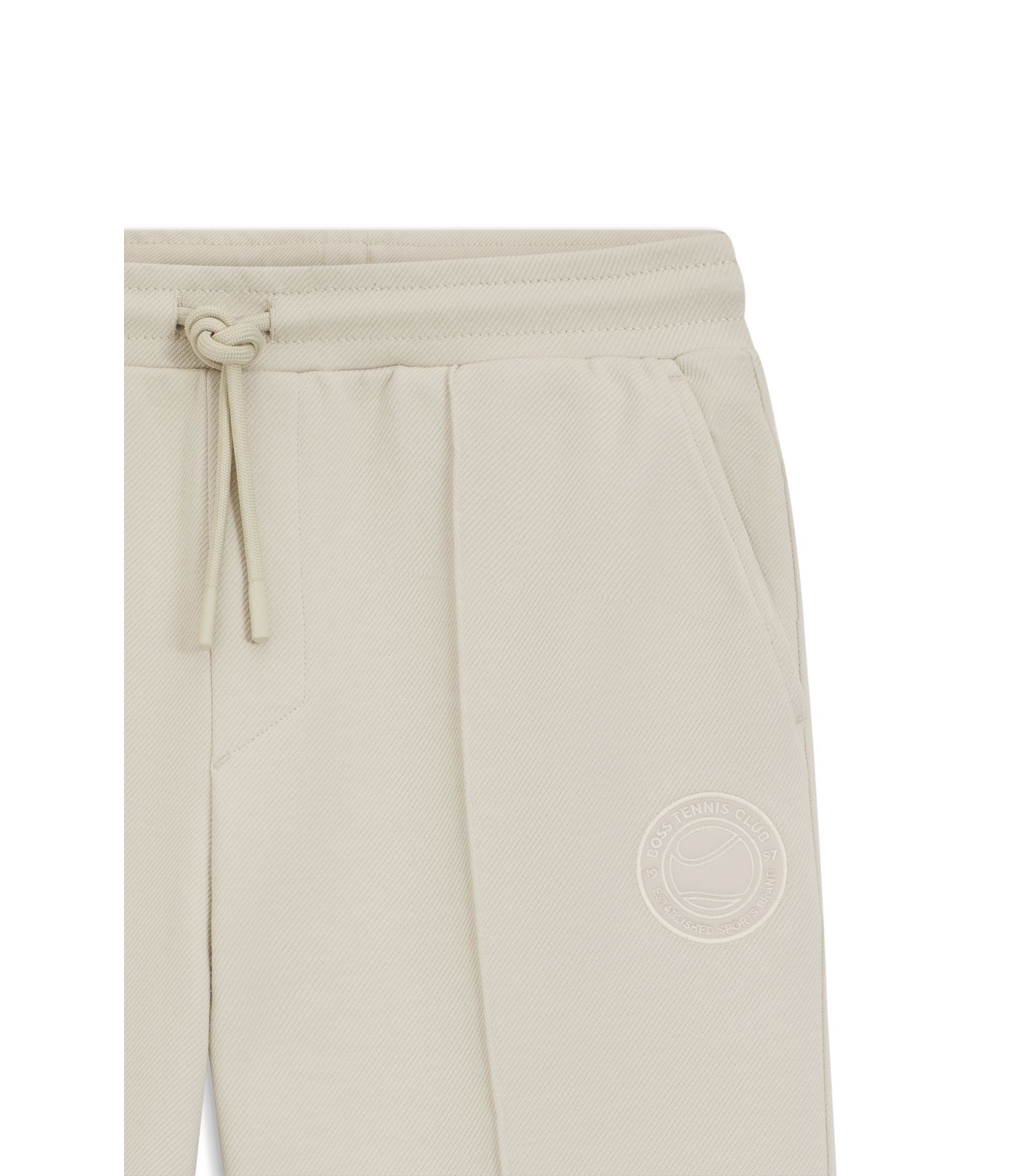 Boss Cotton Blend Tracksuit Bottoms With Tennis Themed Logo Light Beige