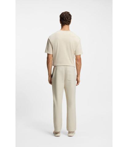 Boss Cotton Blend Tracksuit Bottoms With Tennis Themed Logo Light Beige