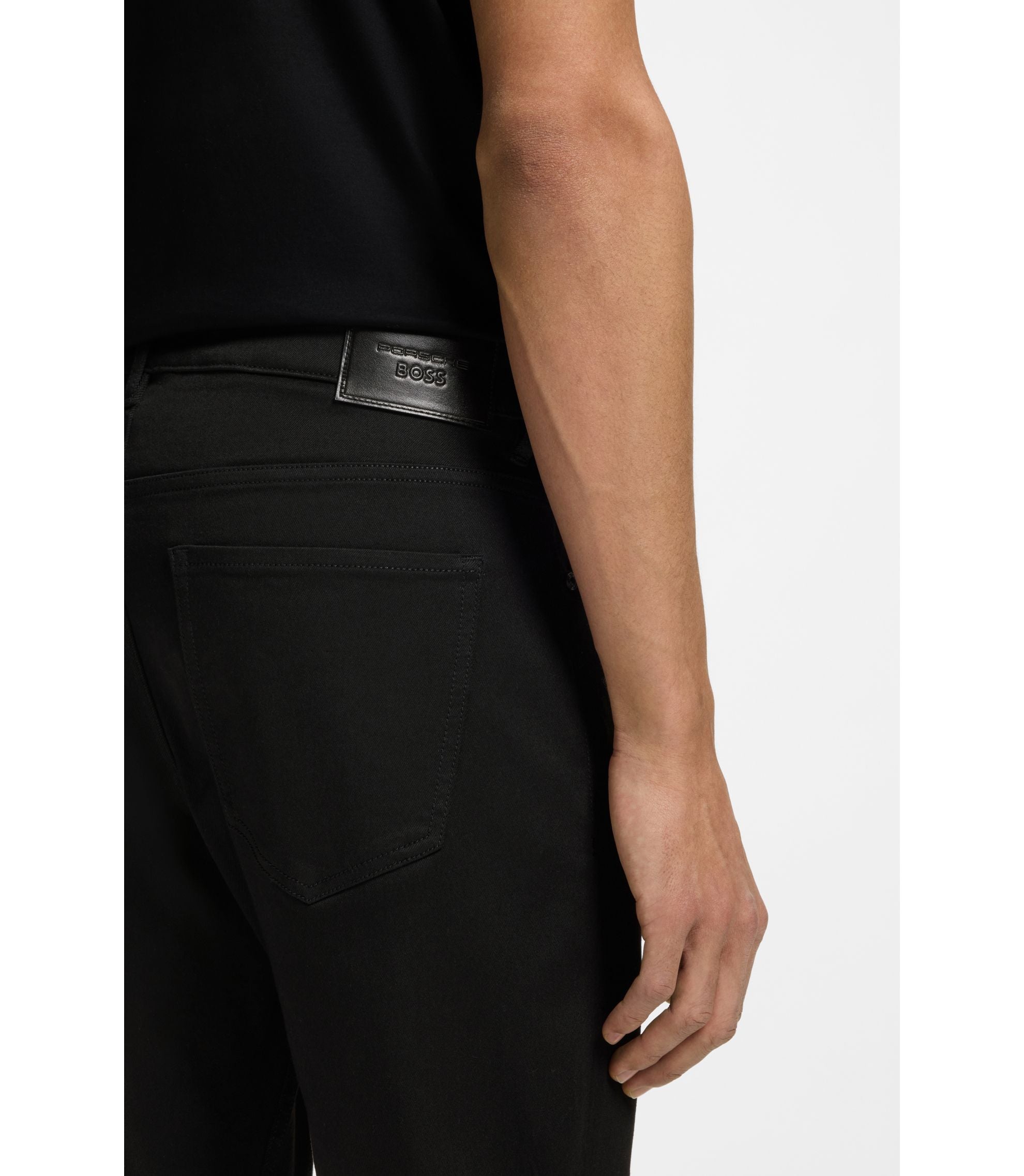 Boss Porsche X Boss Tapered Fit Pants In Stretch Denim Black