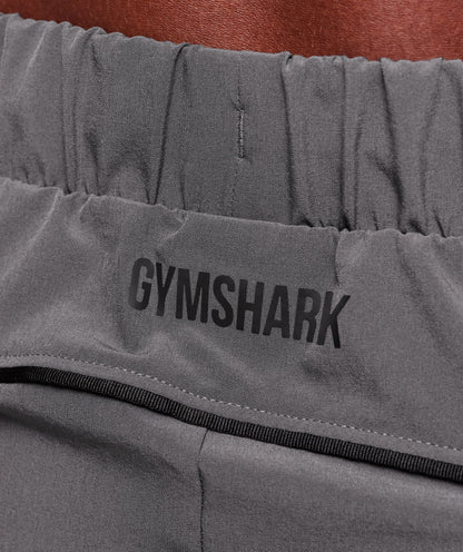 Gymshark Arrival Woven Block Joggers Dark Grey