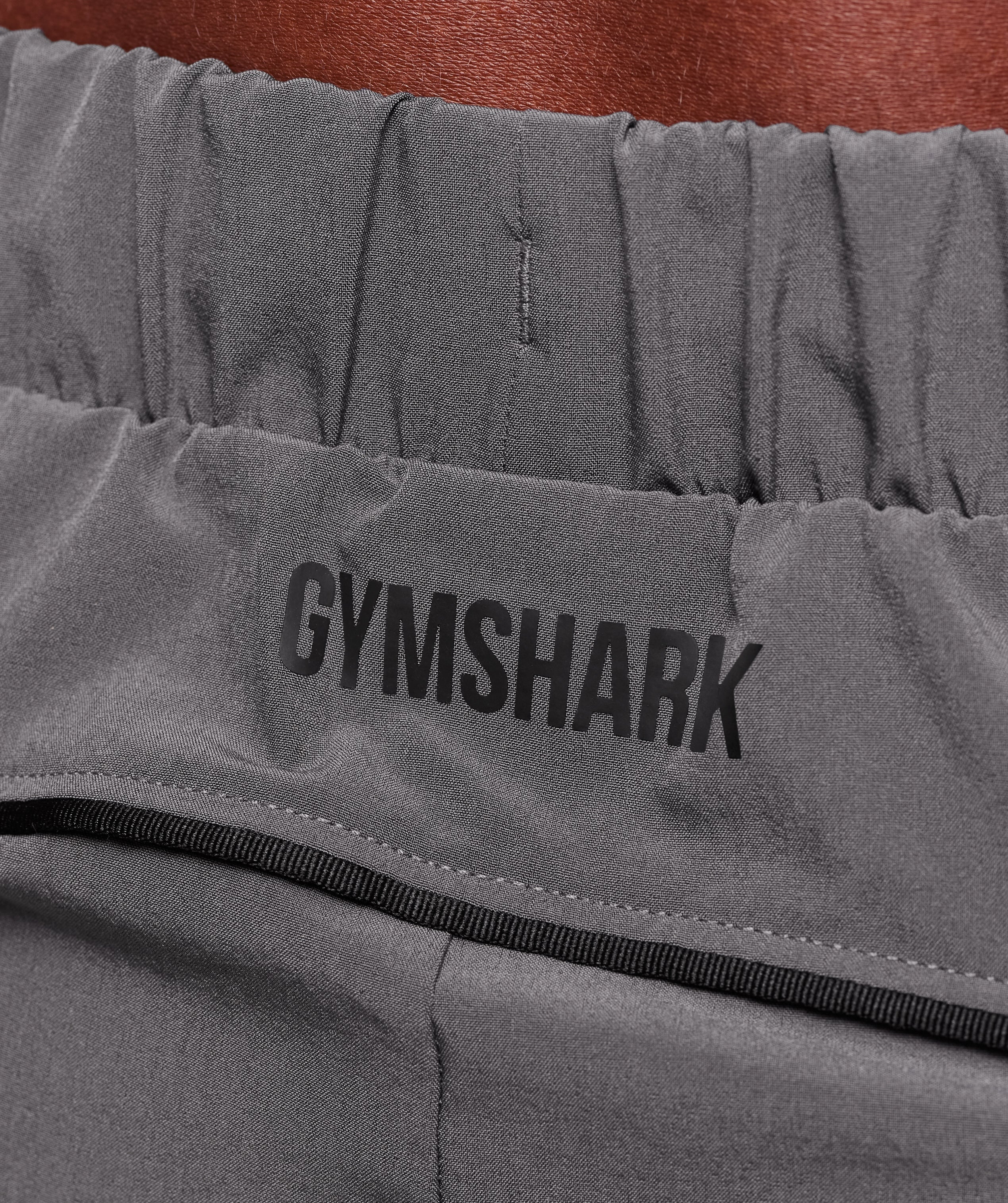 Gymshark Arrival Woven Block Joggers Dark Grey