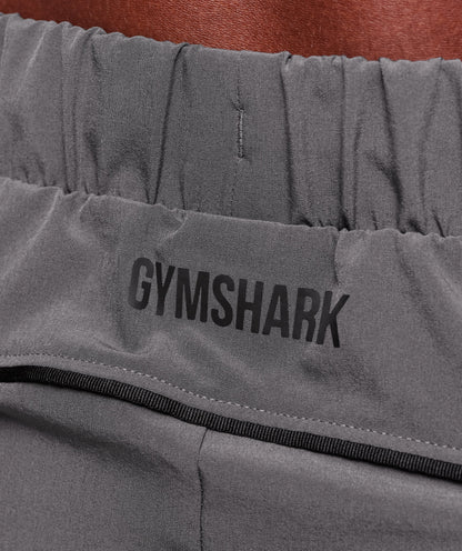 Gymshark Arrival Woven Block Joggers Dark Grey