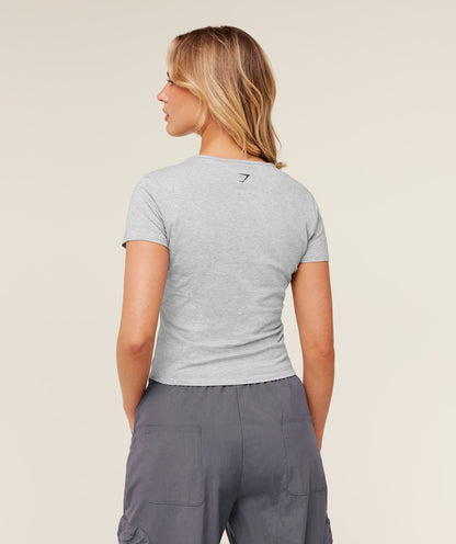 Women's Gymshark Worn Crest Graphic Baby Tee Light Grey Core Marl