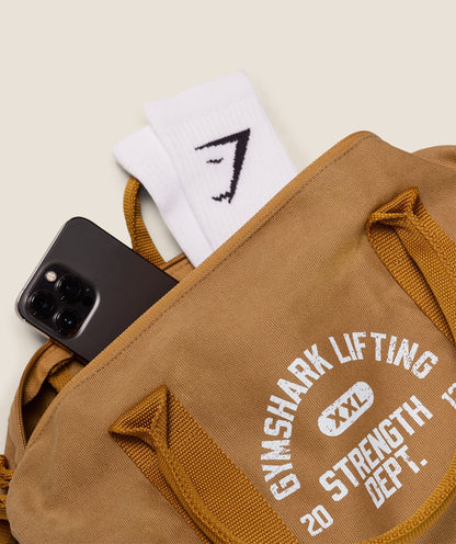 Gymshark Strength Dept Mini Canvas Duffle Bag Antique Gold