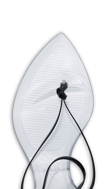 Alaïa Invisible Thong In Patent Leather